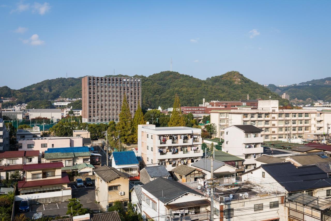 Business Hotel Sun Garden Matsuyama Matsuyama  Bagian luar foto