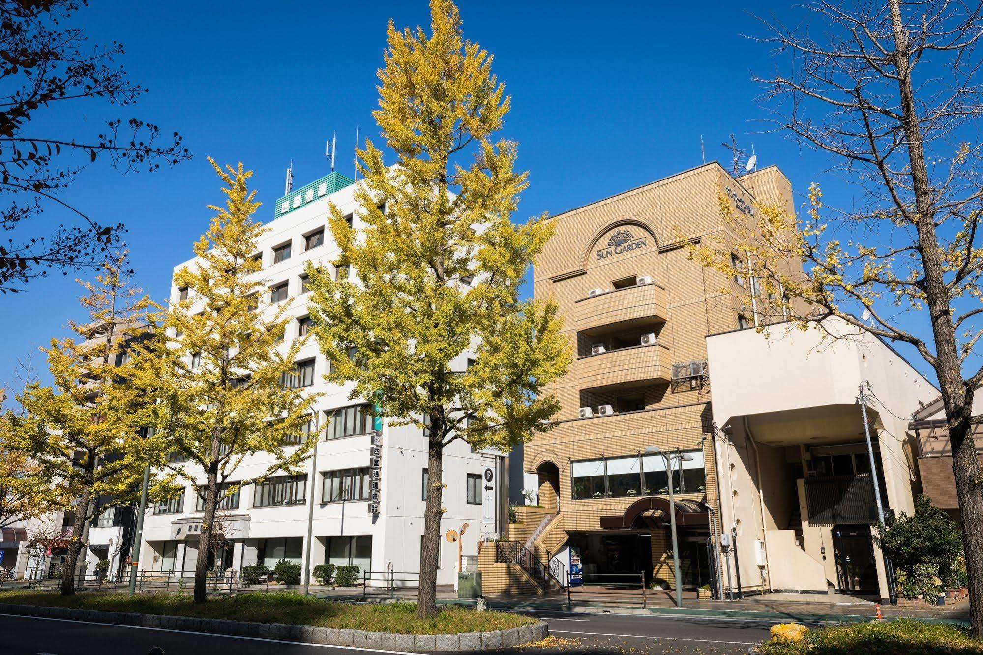 Business Hotel Sun Garden Matsuyama Matsuyama  Bagian luar foto